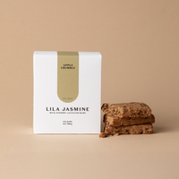 Apple Crumble Lila Jasmine milk support lactation bars open and crumbled on a beige background