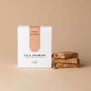 Lila Jasmine apricot and chocolate milk support lactation bars with packaging on a beige background