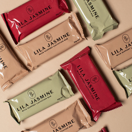 Flatlay of Lila Jasmine milk support lactation bars in various colours on a beige background.
