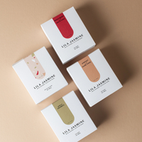 Lila Jasmine Deluxe Variety Bundle on a on a beige background. Featuring all flavours: mixed berry and white choc, apricot and dark choc, and apple crumble, perfect for breastfeeding mums and make a wonderful gift. Save 10% on bar bundles. 