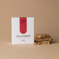 Lila Jasmine Mixed Berry & White Chocolate milk support lactation bars on a beige background
