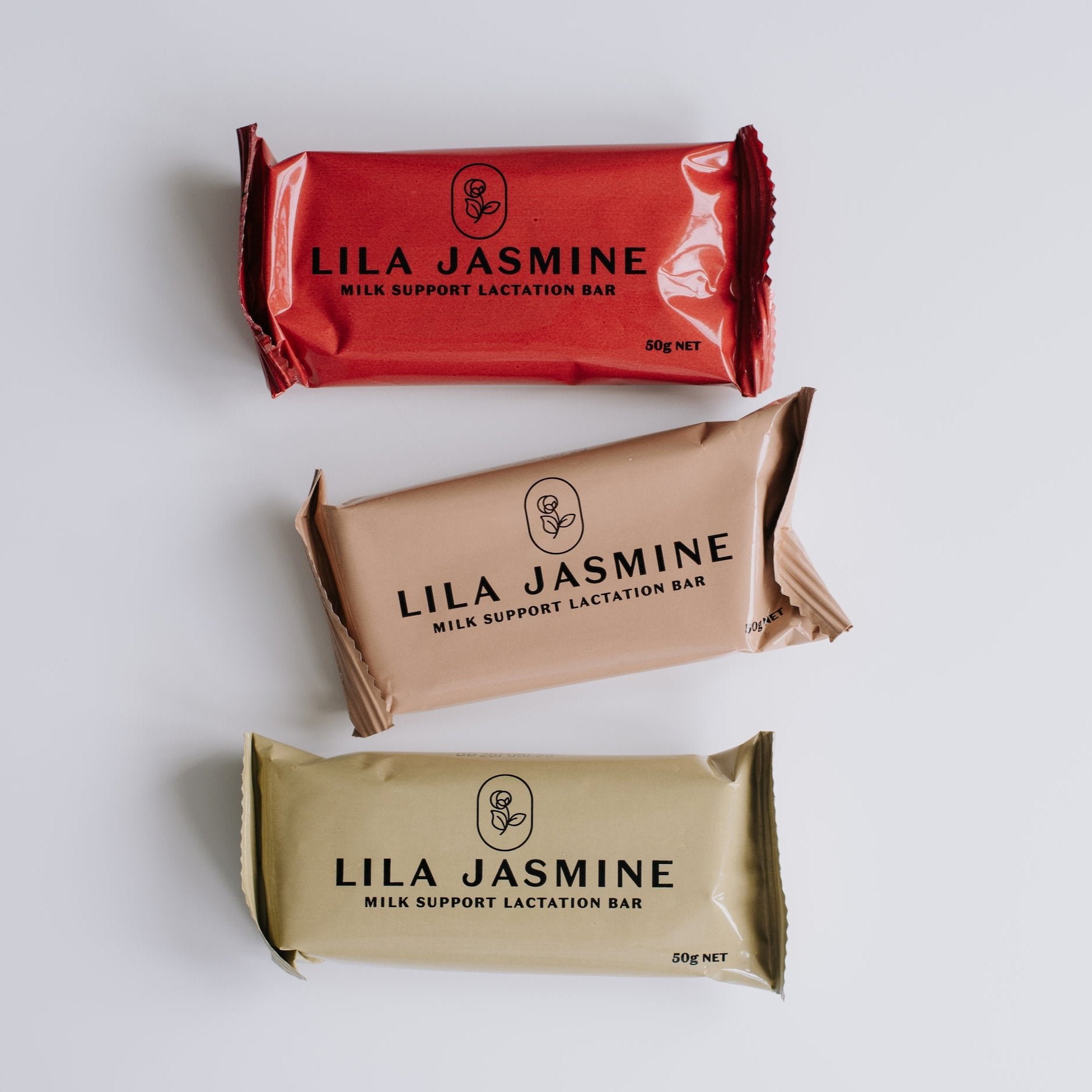 Lila Jasmine Mix of Six lactation bar bundle, featuring two bars of each flavour: mixed berry, apricot and dark chocolate, and apple crumble, designed to support breastfeeding mums.